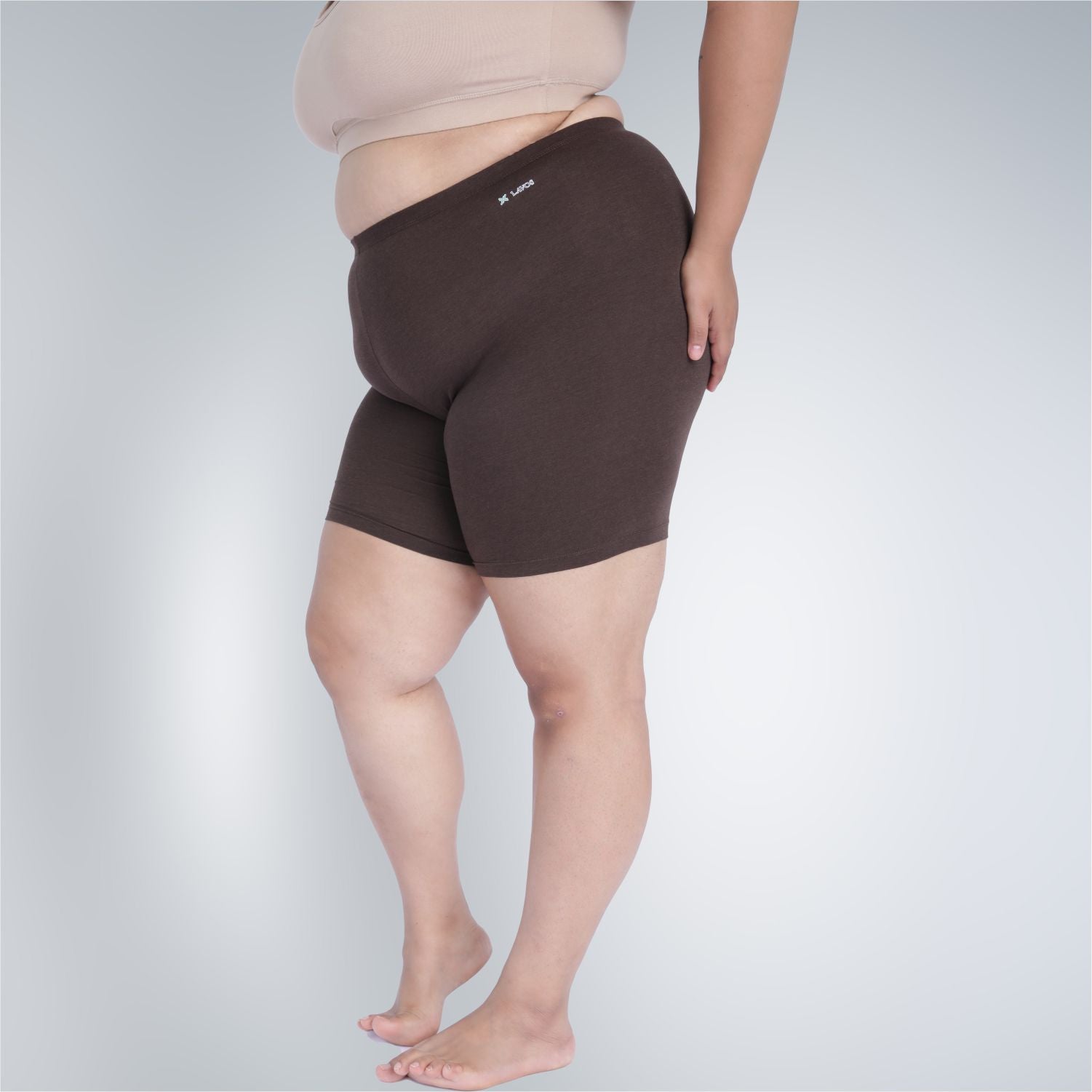Bamboo Anti-chafing Shorties for ladies & women's photograph that's made with an innovative bamboo and organic cotton fabric from Lavos Performance, a carbon neutral eco-fashion company. Under Dress Woman's Shorty • Made from natural bamboo fabrics • Comfier & functional than regular cotton • Anti chafe Shorty, also known as layering tights • Ultra comfy • Buttery smooth fabric • Sweat wicking & super breathable • Under dress wear for ultimate coverage • Ultimate woman shorty under wear for comfort, style a