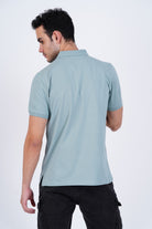 Bamboo Cotton Jersey Polo For Men's photograph that's made with an innovative bamboo and organic cotton fabric from Lavos Performance, a carbon neutral eco-fashion company. 