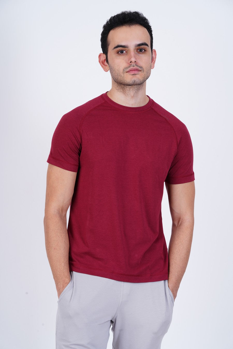 Men's Raglan T-Shirt's photograph that's made with an innovative bamboo and organic cotton fabric from Lavos Performance, a carbon neutral eco-fashion company. 