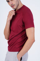 Men's Raglan T-Shirt's photograph that's made with an innovative bamboo and organic cotton fabric from Lavos Performance, a carbon neutral eco-fashion company. 