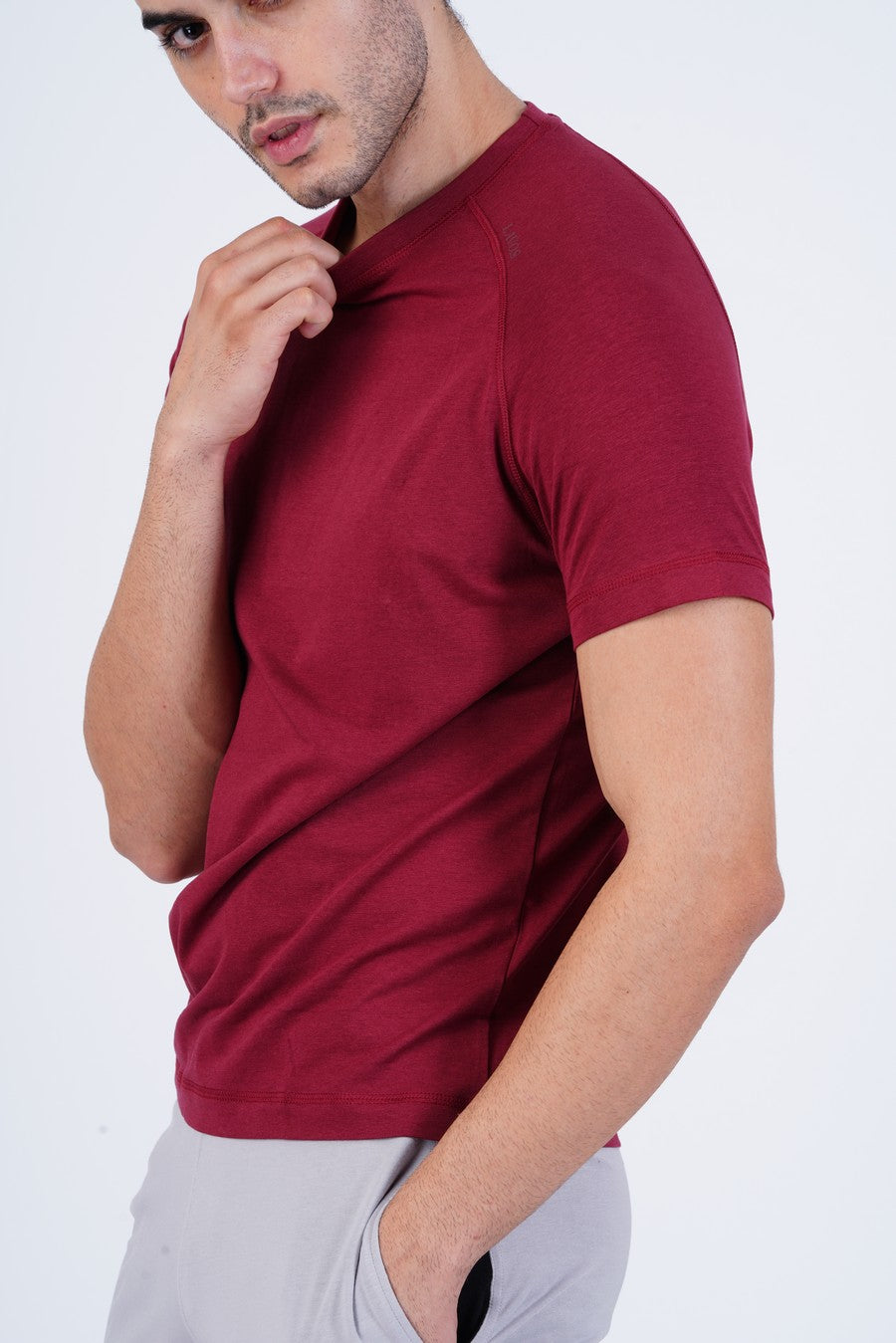 Men's Raglan T-Shirt's photograph that's made with an innovative bamboo and organic cotton fabric from Lavos Performance, a carbon neutral eco-fashion company. 
