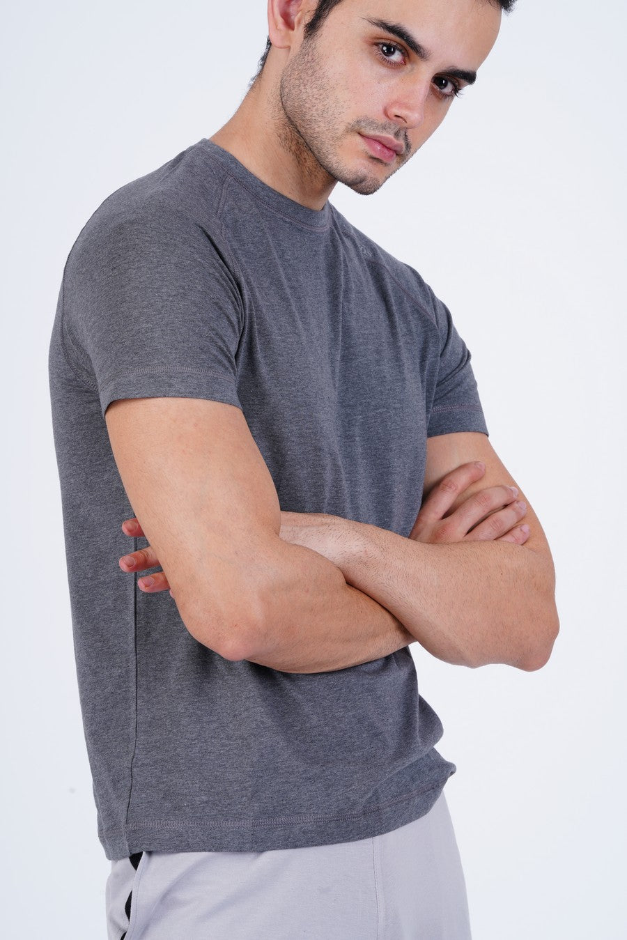 Men's Raglan T-Shirt's photograph that's made with an innovative bamboo and organic cotton fabric from Lavos Performance, a carbon neutral eco-fashion company. 