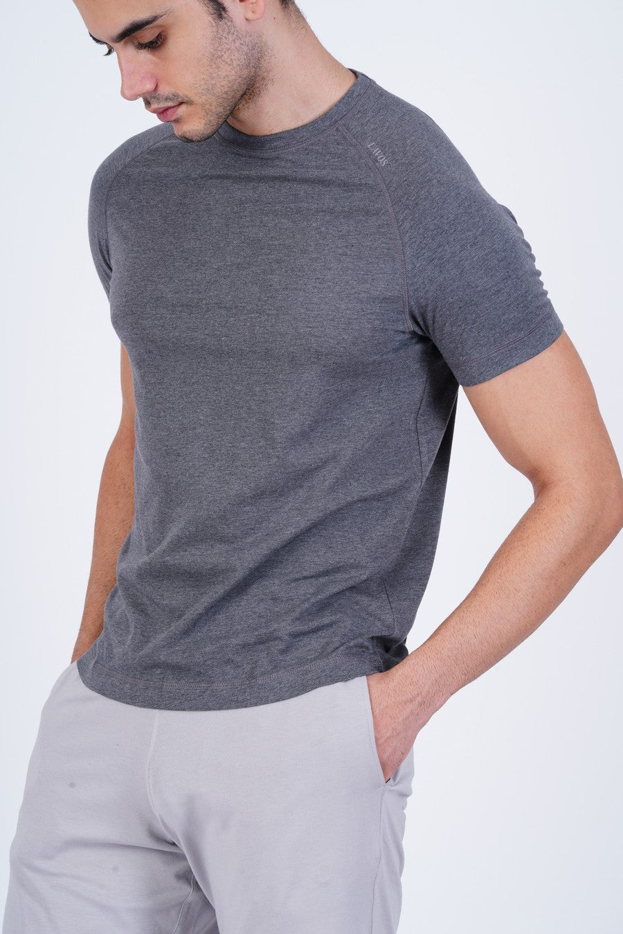 Men's Raglan T-Shirt's photograph that's made with an innovative bamboo and organic cotton fabric from Lavos Performance, a carbon neutral eco-fashion company. 