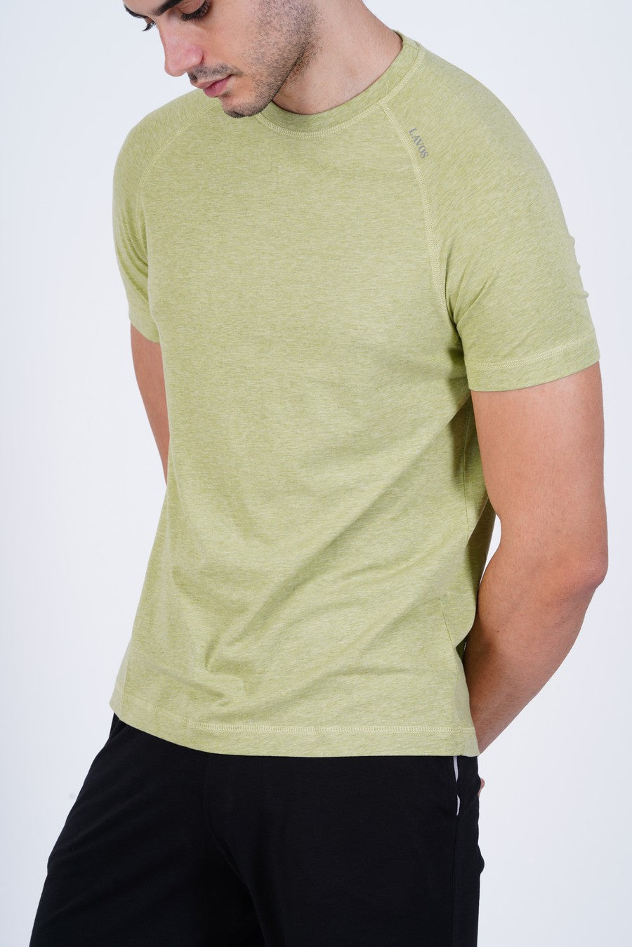 Men's Raglan T-Shirt's photograph that's made with an innovative bamboo and organic cotton fabric from Lavos Performance, a carbon neutral eco-fashion company. 