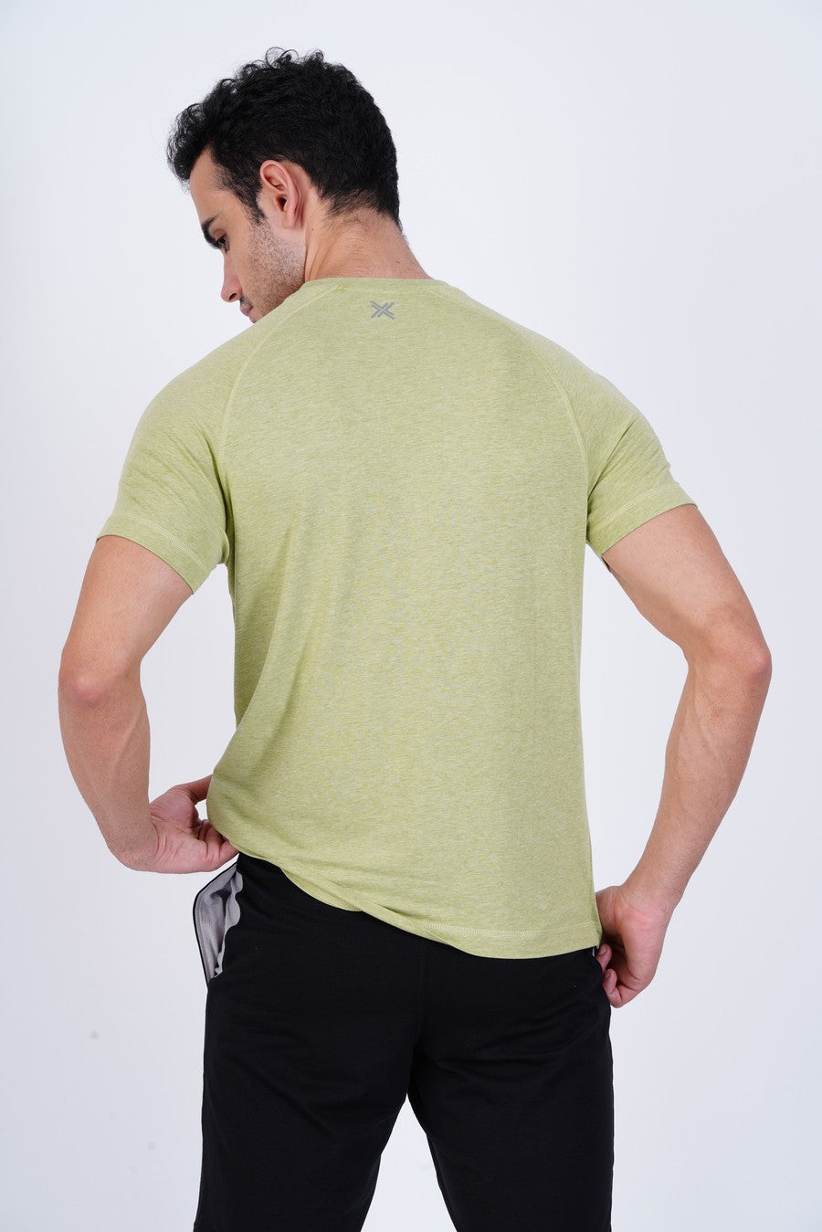 Men's Raglan T-Shirt's photograph that's made with an innovative bamboo and organic cotton fabric from Lavos Performance, a carbon neutral eco-fashion company. 
