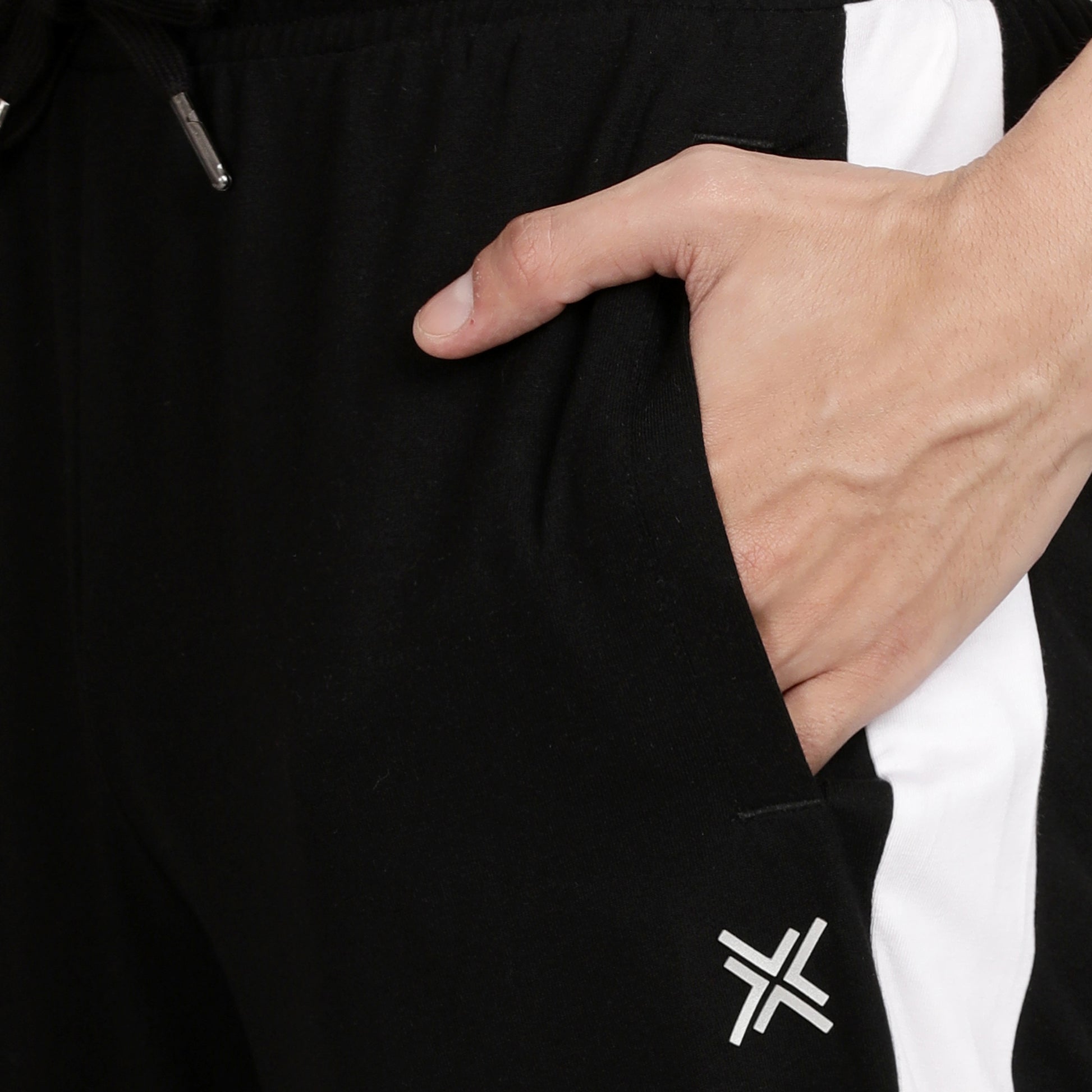 Lavos Mens Active Track Pants for Workouts's photograph that's made with an innovative bamboo and organic cotton fabric from Lavos Performance, a carbon neutral eco-fashion company. Buy Zipper Track Pant For Men Online.The super-soft fabric feels amazing on the skin and our Bamboo Performance Technology which has Bamboo fiber is durable, breathable, and wicks sweat away. Explore Latest Collection Of Bamboo Clothes At Lavos Performance.
